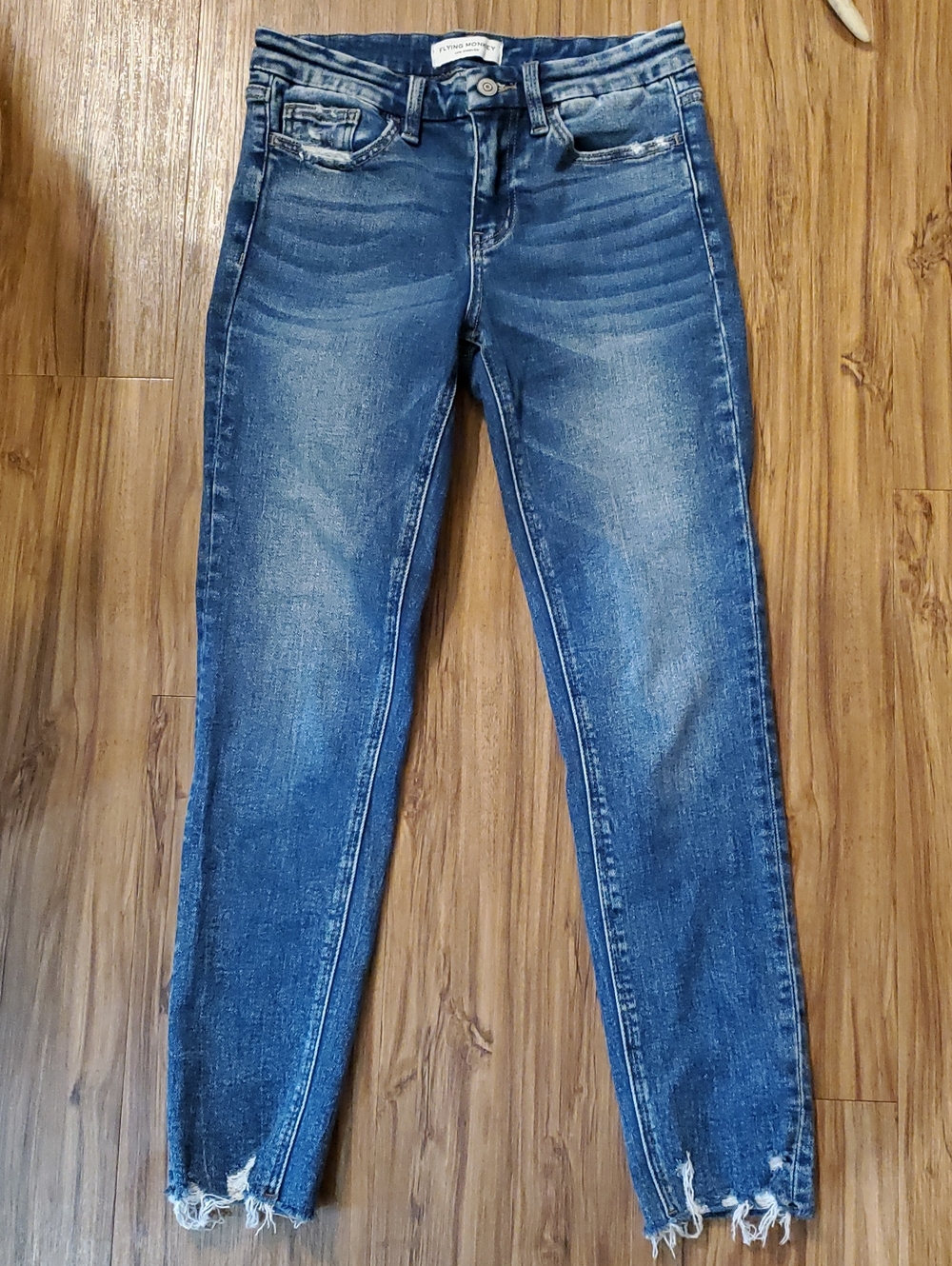 Women’s Blue Distressed Slim Jeans